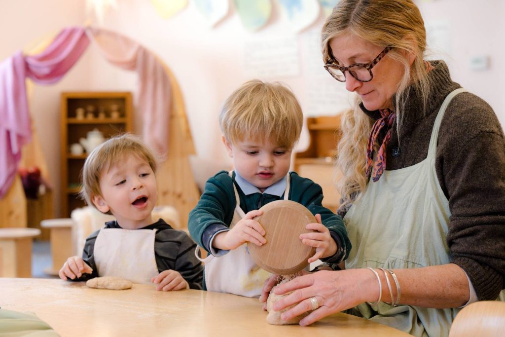boys in early childhood class baking bread