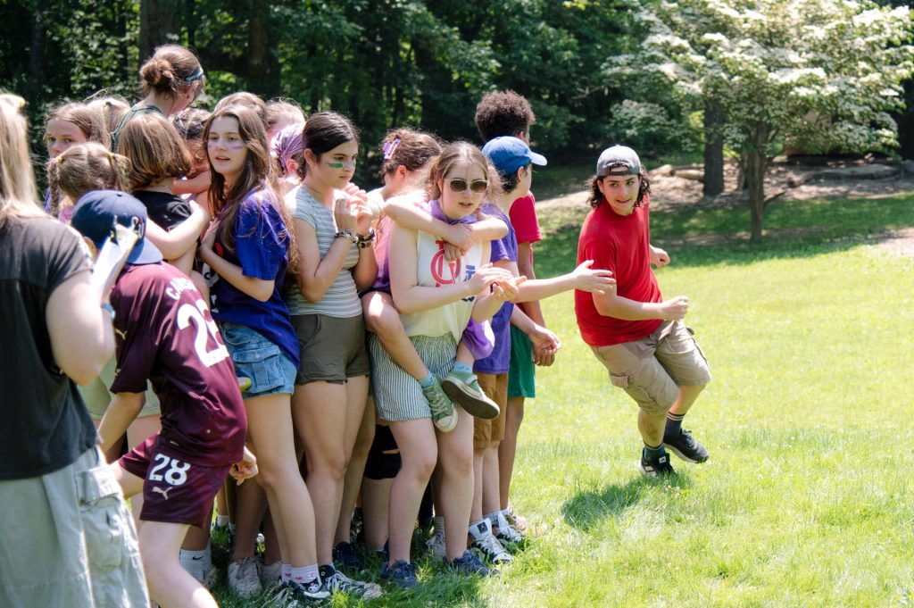 group of middle schoolers playing outdoors on field day