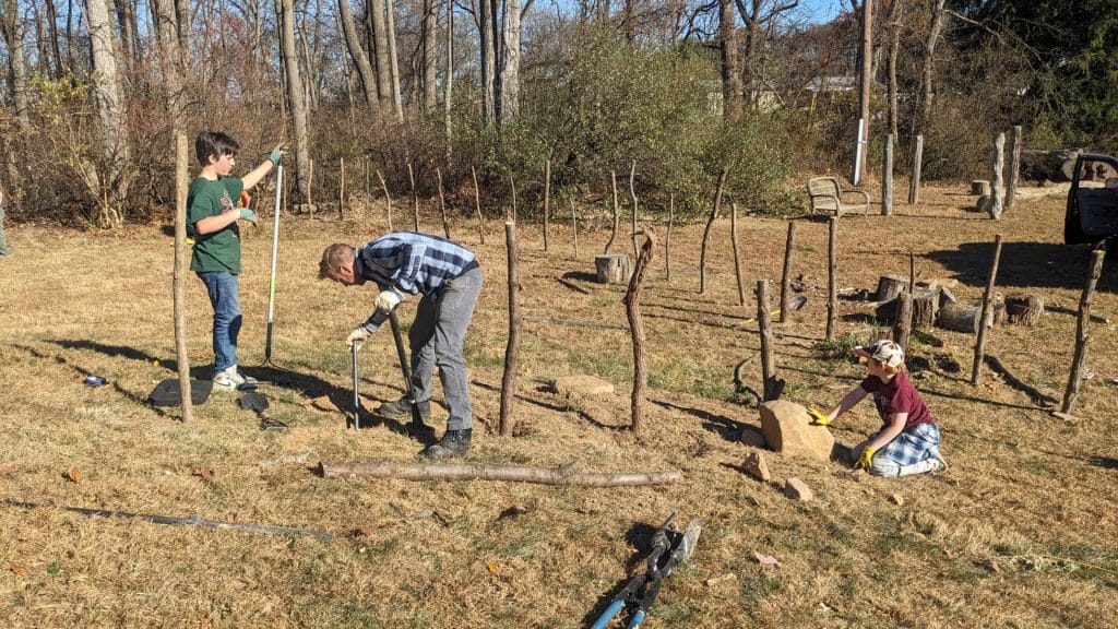 students working out in the garden