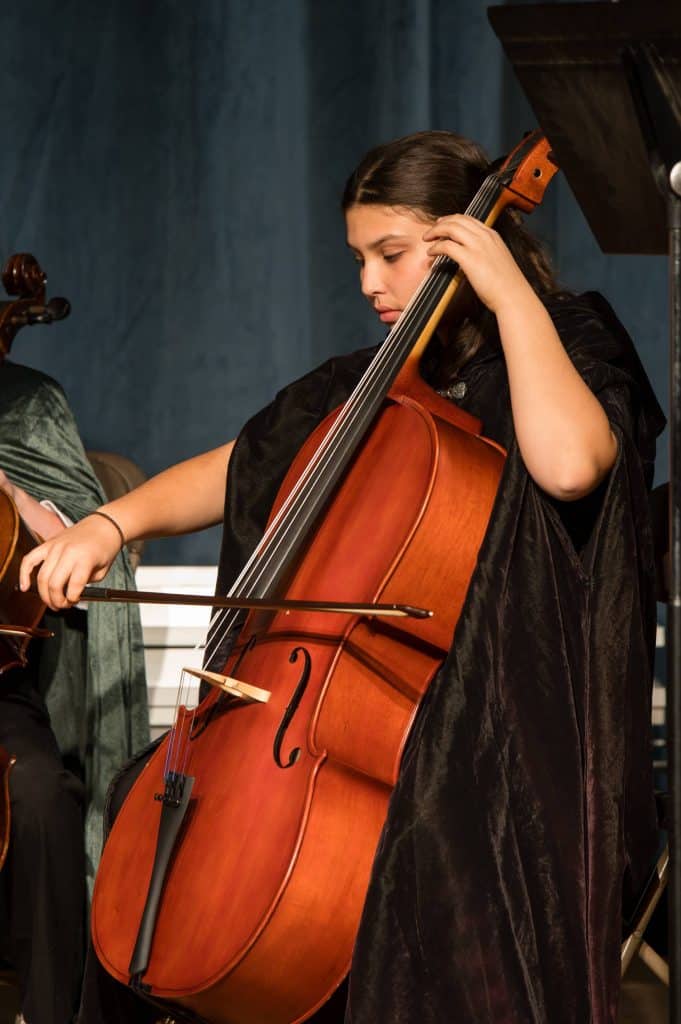 middle school girl playing bass