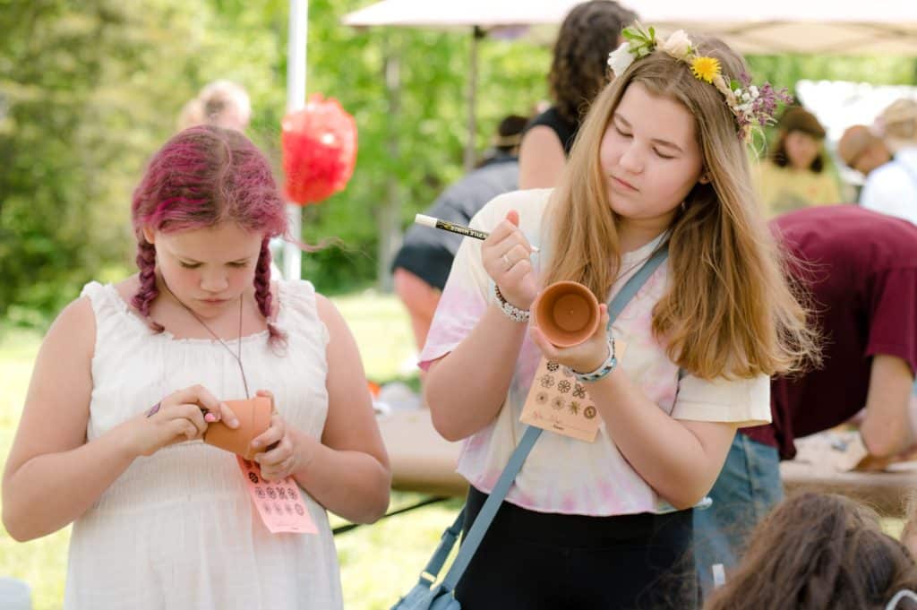 girls planting seeds