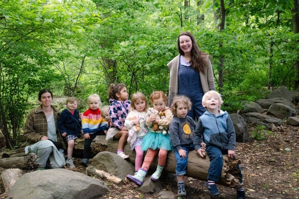 5 early childhood students outside in winter jackets