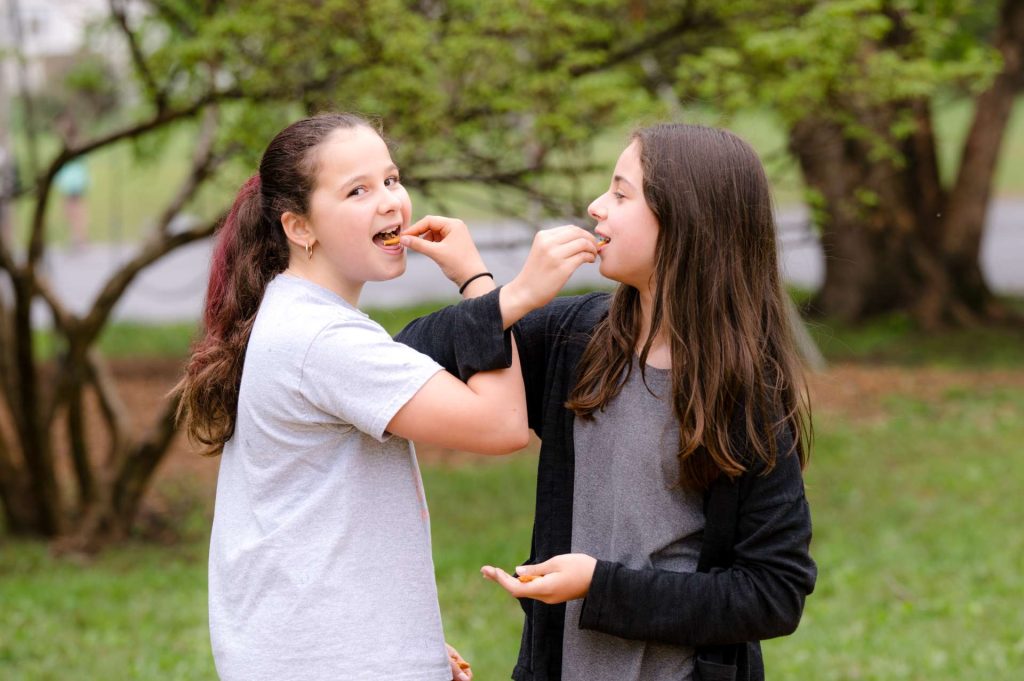 two female students eating