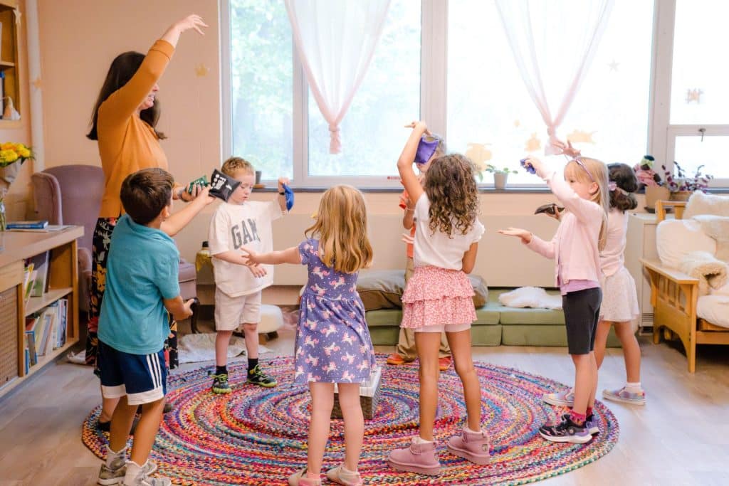 two first graders eating snacks at winter fair