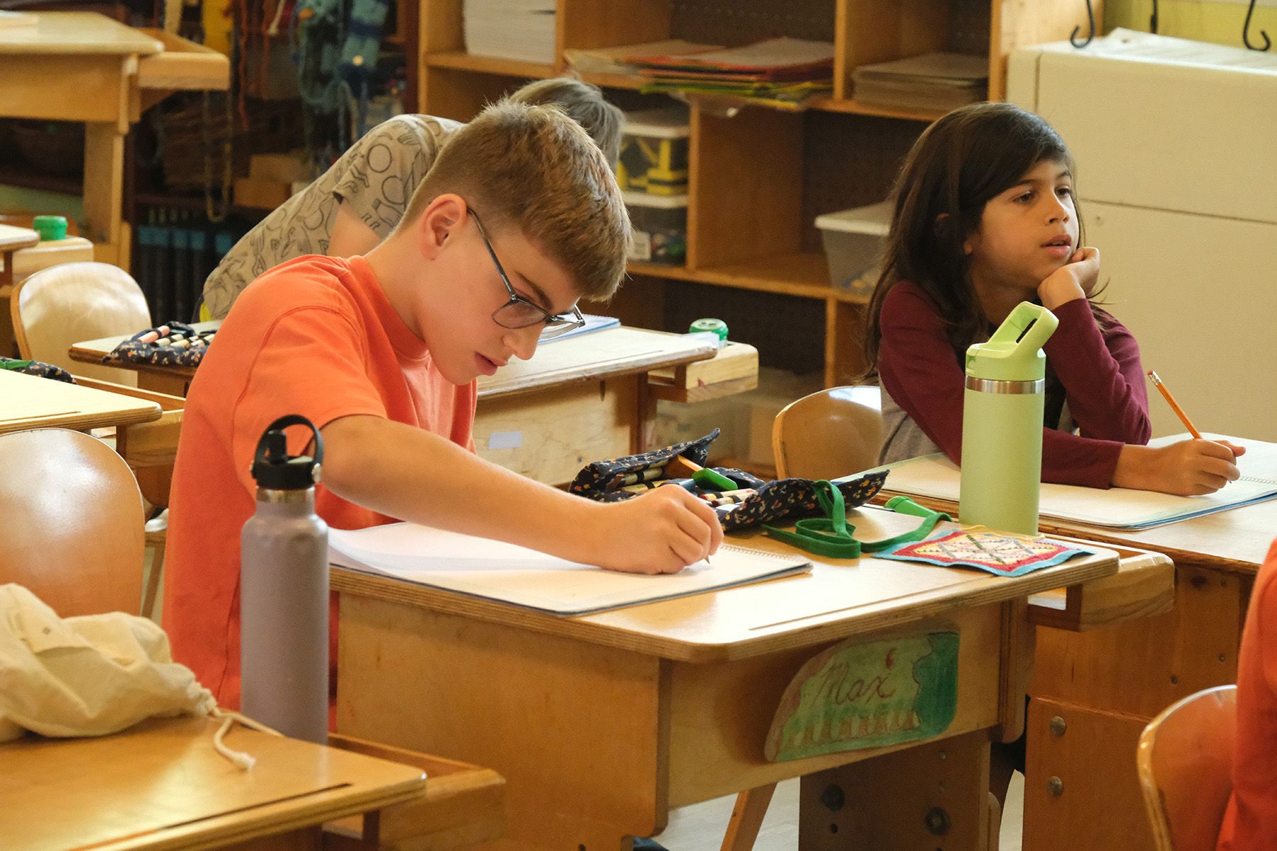 first graders working at their desks