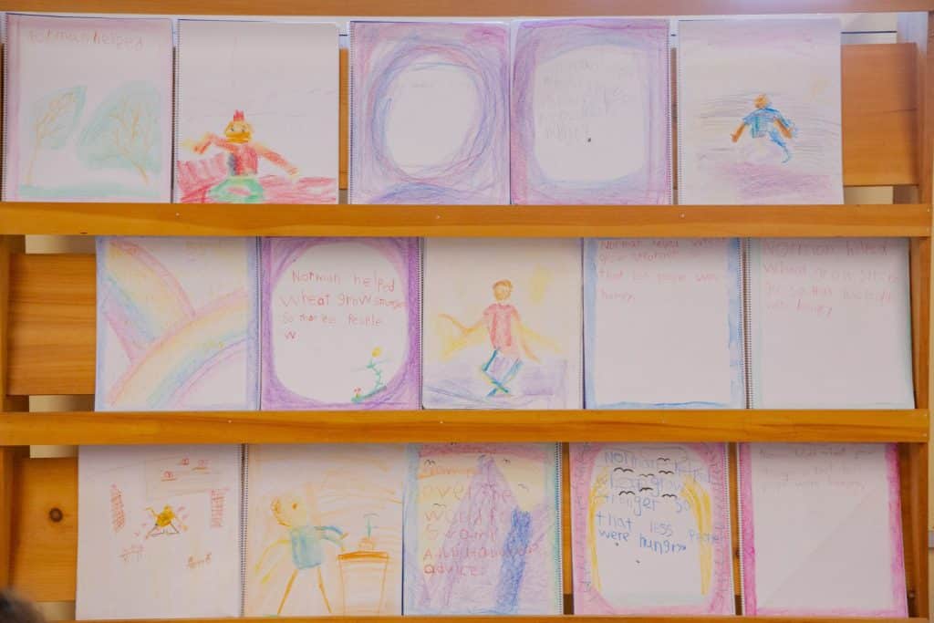 assortment of drawings and art made by students