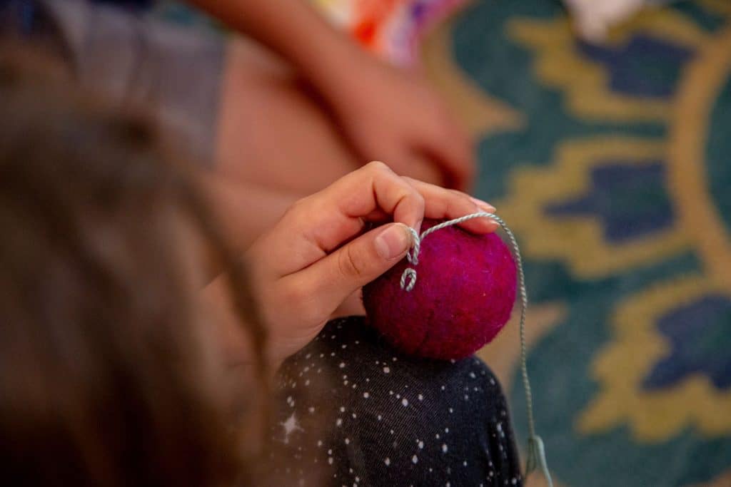 young girl doing hand crafts